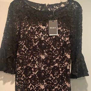 DNKY women’s dress. Black lace over-lay over top nude sheath. Size 4